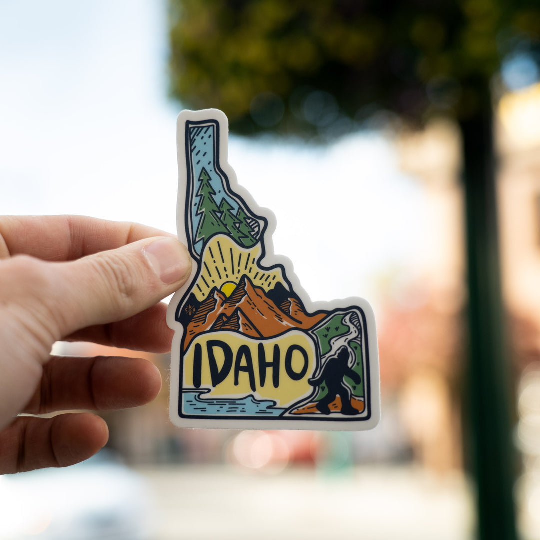 Scenes of Idaho, Idaho Shaped Sticker. CDA